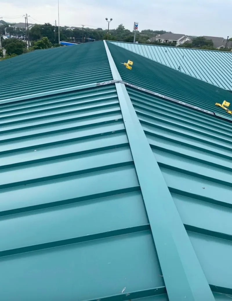 Green commercial metal roof ridge and valley for Metal Roof Repair in Overland